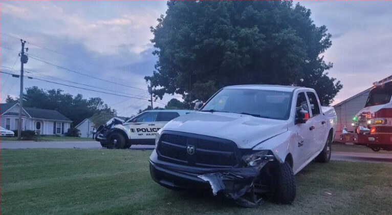 Suspect Drives Truck into Two Parked Patrol Vehicles as Officers Investigate Domestic-related Incident