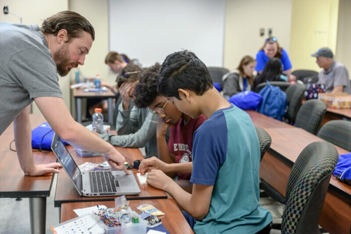 Middle Tennessee State University participate in a one-week summer STEM camp hosted by the departments of biology, chemistry and engineering technology for students entering 10th and 11th grades. Attendees spending